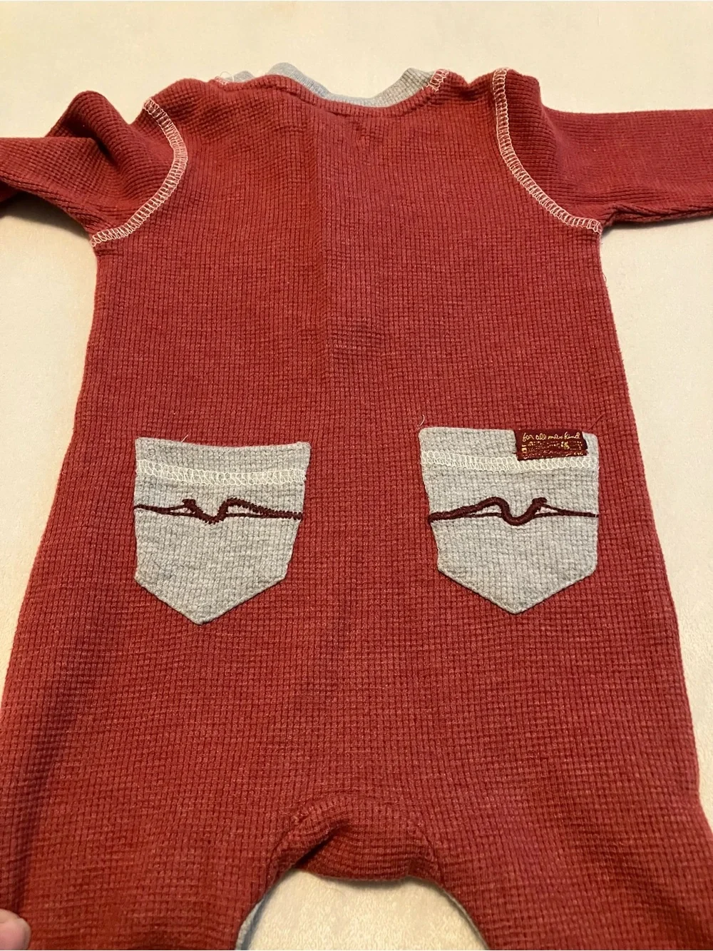 Cozy Red Waffle-Knit Baby One-Piece with Chest Pocket
